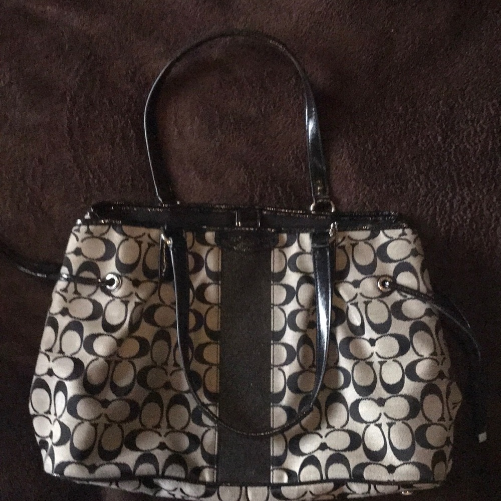Medium sized Coach purse. Great shape. Like new